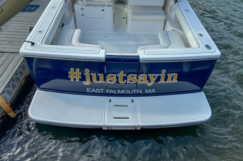 Slide: The Image of 2001 Tiara Yachts 2900 Coronet with "#justsayin" text, docked in East Falmouth, MA. - 33