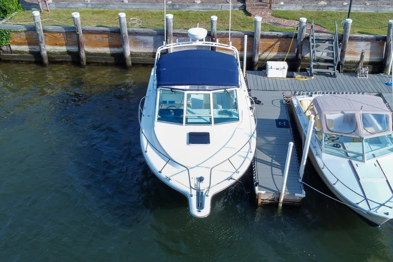 Slide: The Image of Aerial view of a 2001 Tiara Yachts 2900 Coronet docked at a marina. - 34