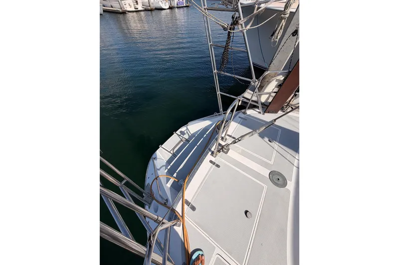 Slide: The Image of Sailboat deck of a 1991 Hylas 51, docked at a marina. - 33