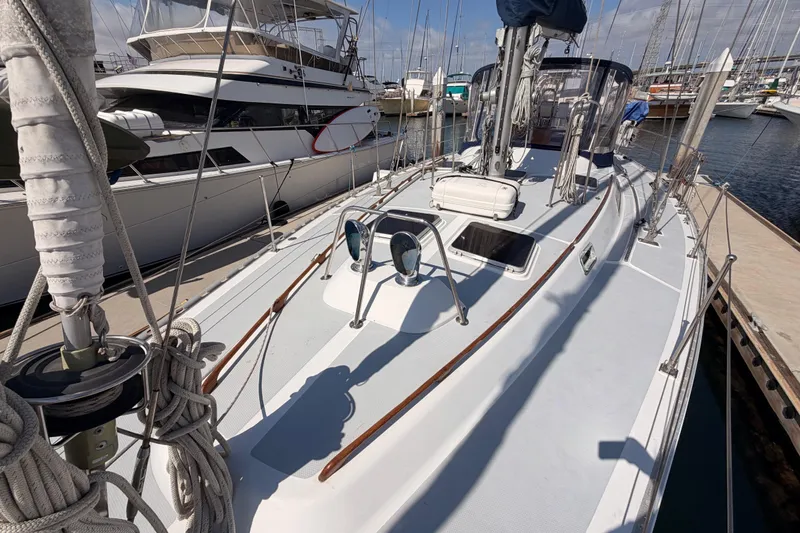 Slide: The Image of Sailboat docked at marina, Hylas 51 model, 1991, with clean deck and rigging. - 21