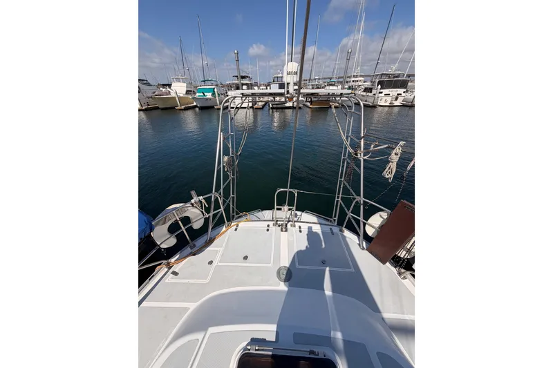 Slide: The Image of Sailboat docked in marina, view from Hylas 51 deck, 1991 model. - 28