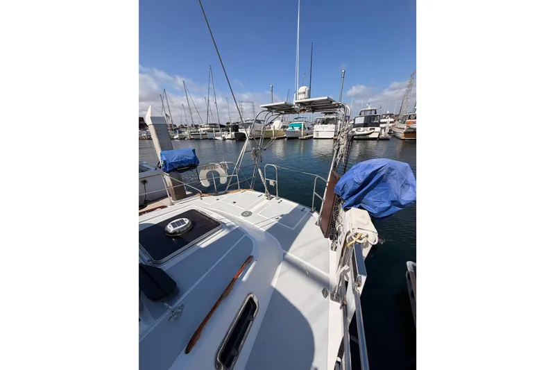 Slide: The Image of Sailboat docked in marina, Hylas 51, 1991 model, sunny day, clear sky. - 22