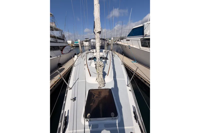 Slide: The Image of Sailboat docked at marina, Hylas 51 model, 1991, with clear blue sky. - 20