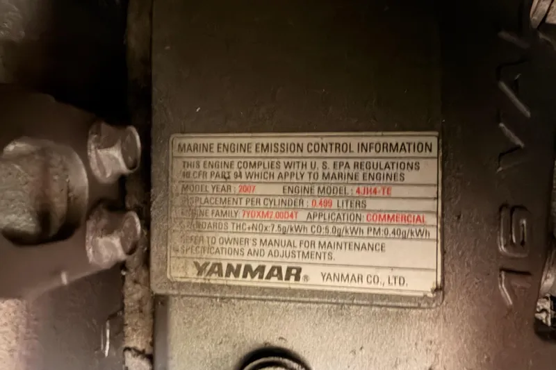 Slide: The Image of Marine engine emission control label on a Yanmar engine, model 4JH4-TE, 1991 Hylas 51. - 88