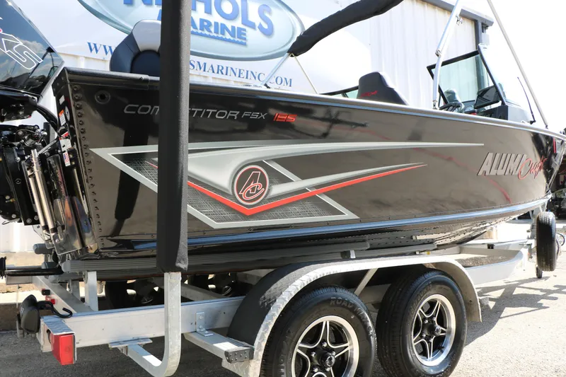 Slide: The Image of 2023 Alumacraft Competitor FSX 185 boat on trailer, side view. - 18