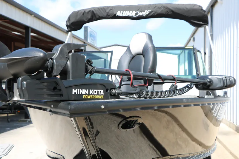 Slide: The Image of 2023 Alumacraft Competitor FSX 185 boat with Minn Kota PowerDrive motor. - 16