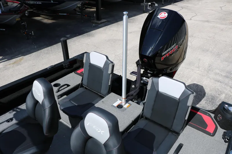 Slide: The Image of 2023 Alumacraft Competitor FSX 185 boat interior with Mercury Pro engine and seating. - 30