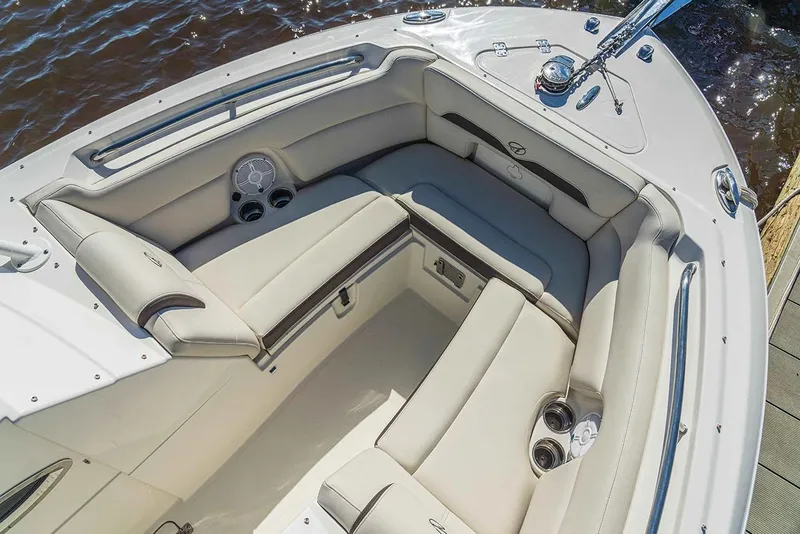 Slide: The Image of Manufacturer Provided Image: Luxurious seating area on 2026 Sailfish 245 DC boat, featuring comfortable cushions and cup holders. - 2
