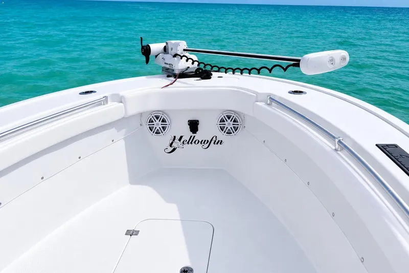 Slide: The Image of 2015 Yellowfin 26 Hybrid boat interior with ocean backdrop, featuring sleek design and modern equipment. - 7