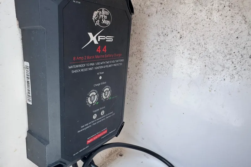 Slide: The Image of Bass Pro Shops XPS 4.4 marine battery charger in a 2004 Sea Fox 225 Bay Fisher. - 24
