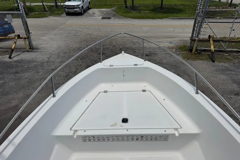 Slide: The Image of 2004 Sea Fox 225 Bay Fisher boat at dock, view from bow. - 12