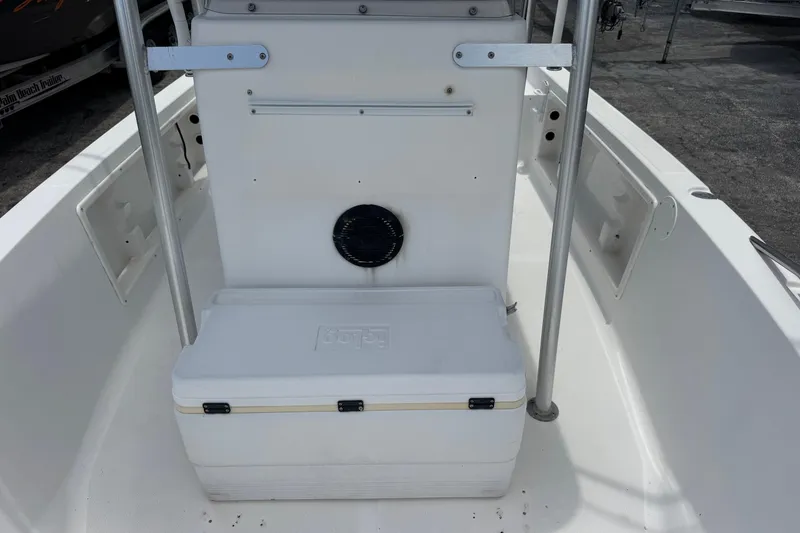 Slide: The Image of 2004 Sea Fox 225 Bay Fisher boat interior with cooler and storage compartments. - 14