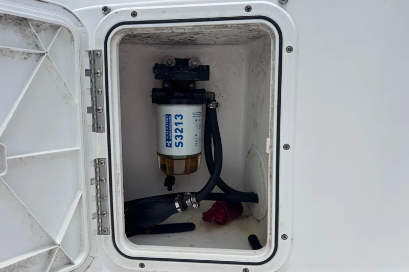 Slide: The Image of Fuel filter compartment of a 2004 Sea Fox 225 Bay Fisher boat. - 21