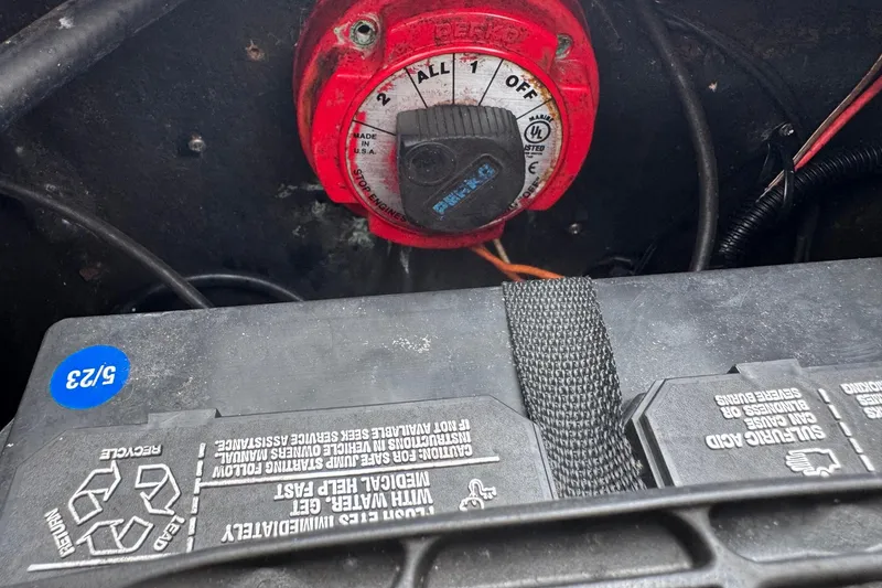 Slide: The Image of Battery switch and compartment in a 2004 Sea Fox 225 Bay Fisher boat. - 28