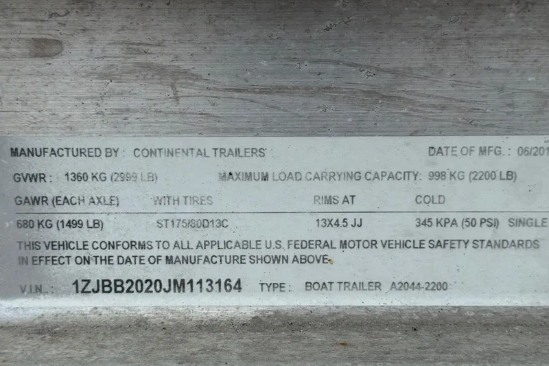 Slide: The Image of Label on Continental Trailers boat trailer, detailing specifications and compliance information. - 38