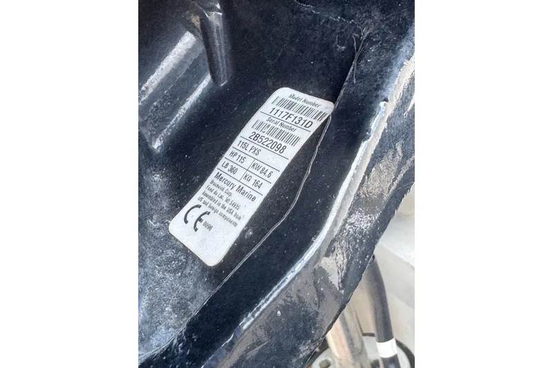 Slide: The Image of Label on a 2004 Sea Fox 225 Bay Fisher boat, displaying serial and model numbers. - 37