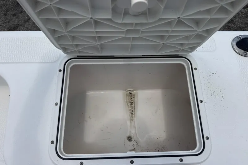 Slide: The Image of Open storage compartment on a 2004 Sea Fox 225 Bay Fisher boat. - 20