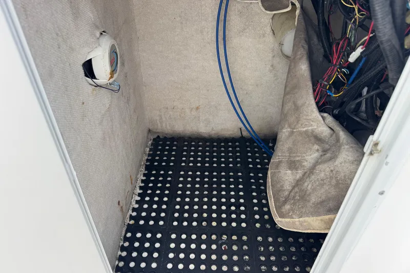 Slide: The Image of Interior view of a 2004 Sea Fox 225 Bay Fisher boat showing wiring and speaker. - 26