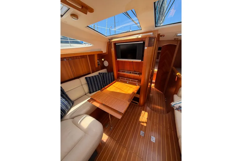Slide: The Image of Luxurious interior of 2007 Saga 409 yacht with wood finish and comfortable seating. - 111