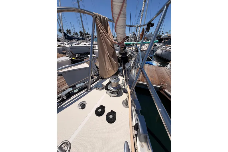Slide: The Image of Sailboat deck view of 2007 Saga 409, docked in a marina with clear skies. - 22