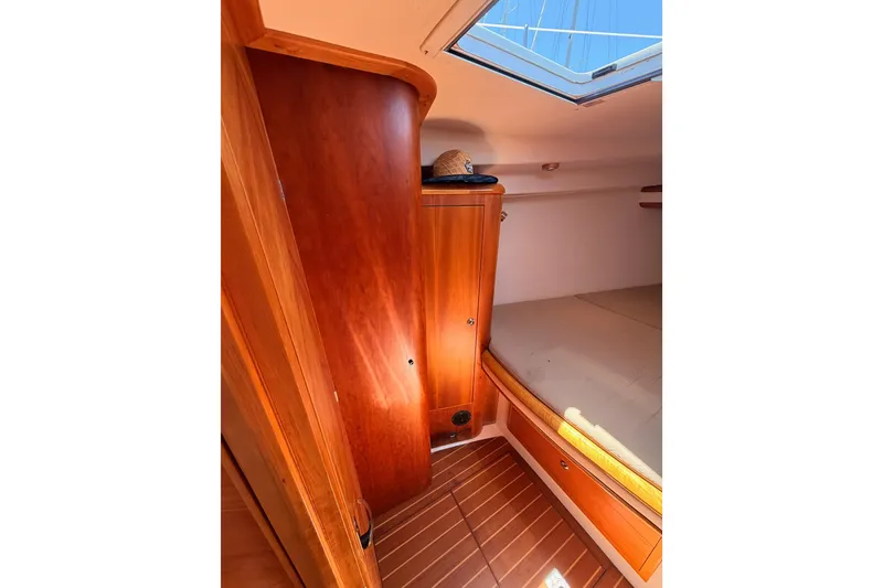 Slide: The Image of Interior cabin of 2007 Saga 409 sailboat with wooden finish and skylight. - 103