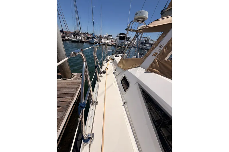 Slide: The Image of Sailboat docked at marina, Saga 409, 2007 model, sunny day, calm waters. - 28