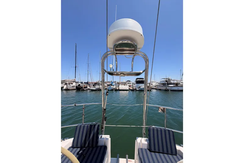 Slide: The Image of Sailing yacht Saga 409, 2007 model, docked in a marina with clear blue skies. - 33