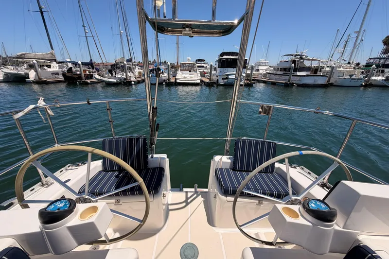 Slide: The Image of Cockpit view of a 2007 Saga 409 sailboat docked in a marina. - 32