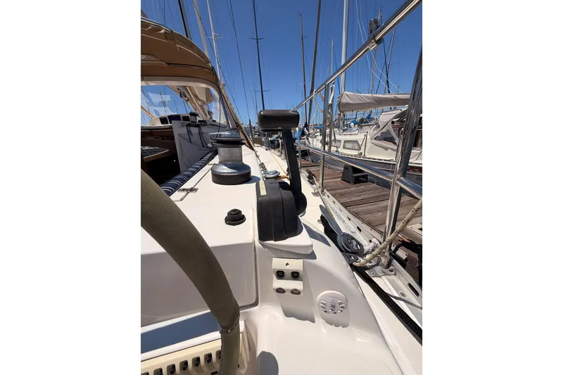 Slide: The Image of Sailing yacht Saga 409, 2007 model, docked at marina with clear blue sky. - 48