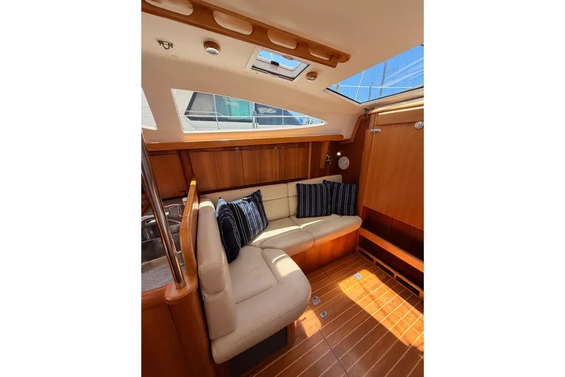 Slide: The Image of Luxurious interior of 2007 Saga 409 yacht with plush seating and wooden finishes. - 87