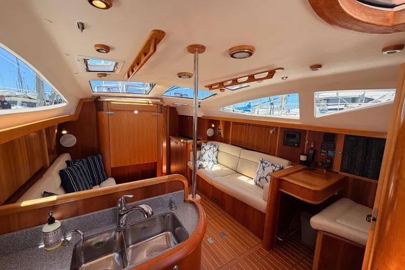 Slide: The Image of Luxurious interior of 2007 Saga 409 yacht with wooden finishes and plush seating. - 72