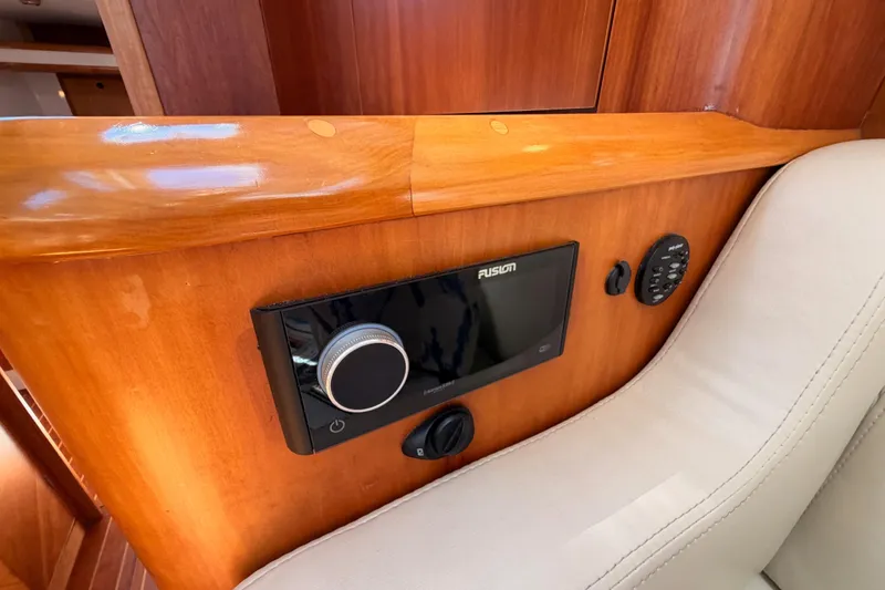 Slide: The Image of Wooden interior of 2007 Saga 409 yacht with Fusion audio system. - 93