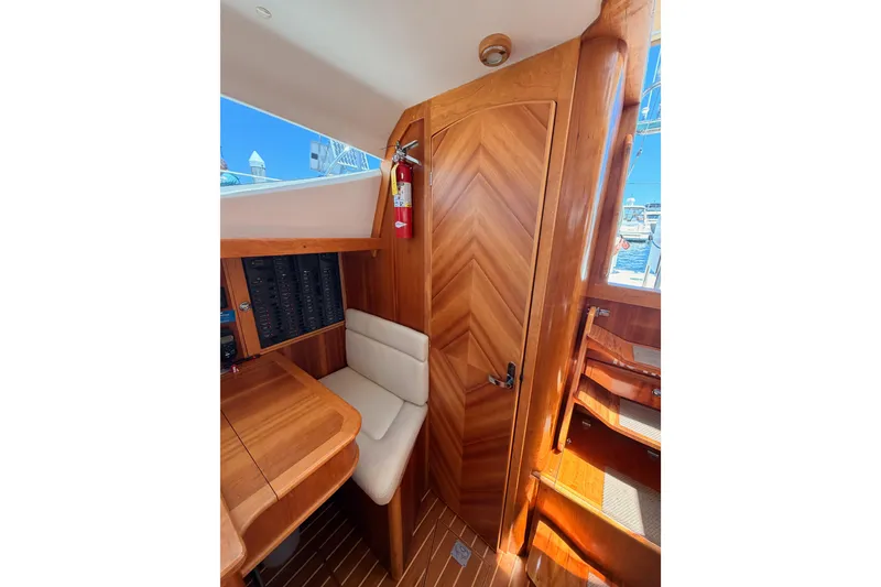 Slide: The Image of Interior of 2007 Saga 409 yacht with wooden finish and seating area. - 76