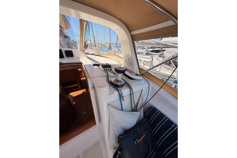 Slide: The Image of Interior view of a 2007 Saga 409 sailboat cockpit with nautical equipment. - 55