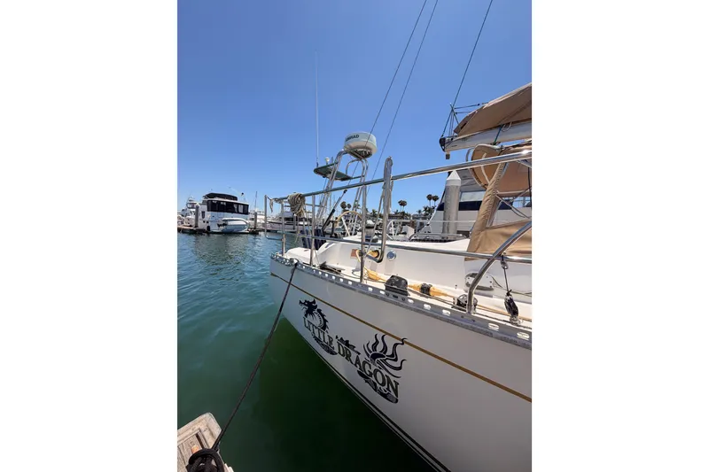 Slide: The Image of Sailboat "Little Dragon" docked in marina, Saga 409 model, 2007. - 3