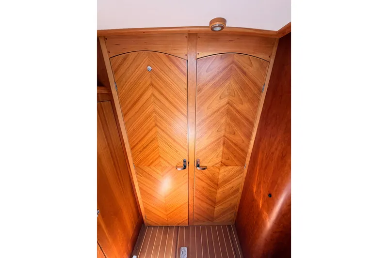 Slide: The Image of Wooden interior door with chevron pattern in 2007 Saga 409 boat. - 106
