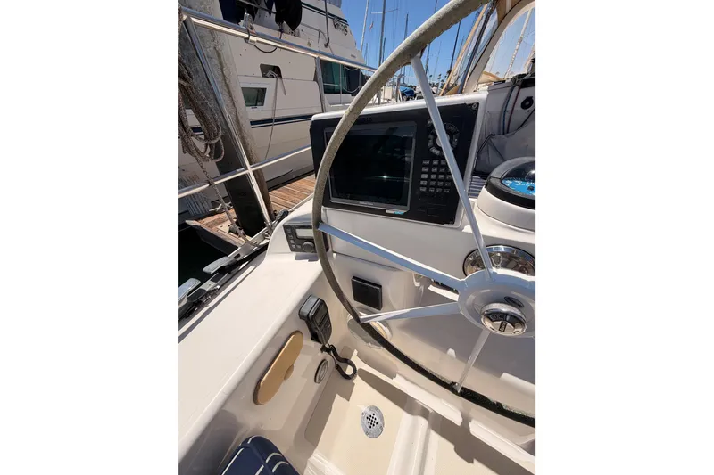 Slide: The Image of Steering wheel and navigation equipment on a 2007 Saga 409 sailboat. - 41