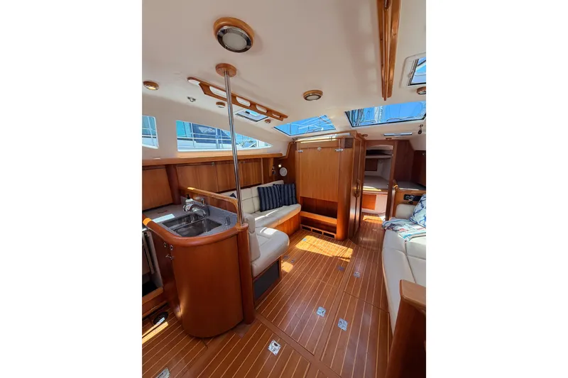 Slide: The Image of Luxurious interior of 2007 Saga 409 yacht with wooden finishes and skylights. - 84