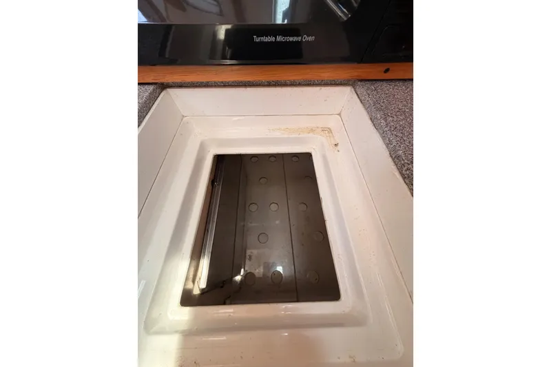 Slide: The Image of Built-in turntable microwave oven in a Saga 409, 2007 model kitchen. - 65