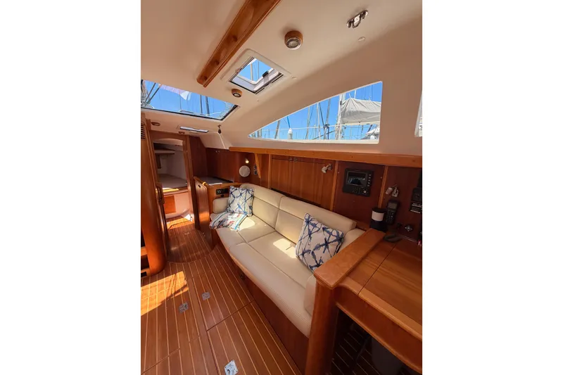 Slide: The Image of Luxurious interior of 2007 Saga 409 yacht with wooden finishes and plush seating. - 86