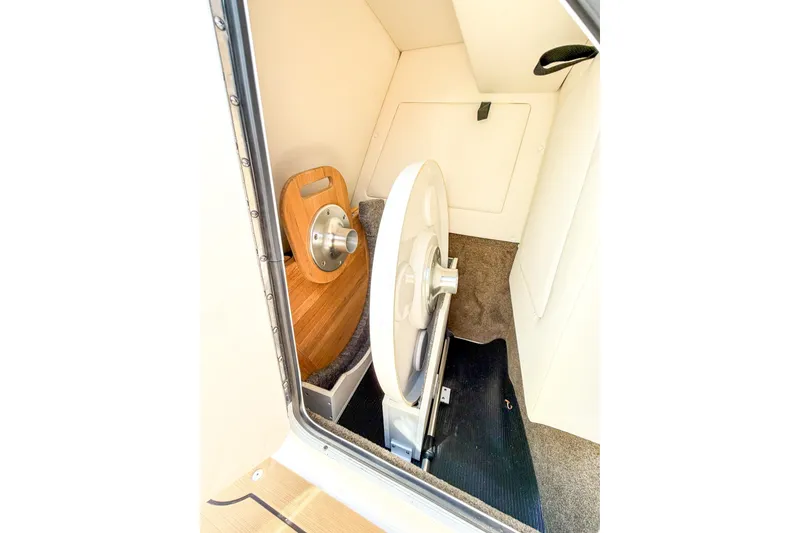 Slide: The Image of Interior storage compartment of 2021 Sea Ray SDX 270 Outboard boat. - 23