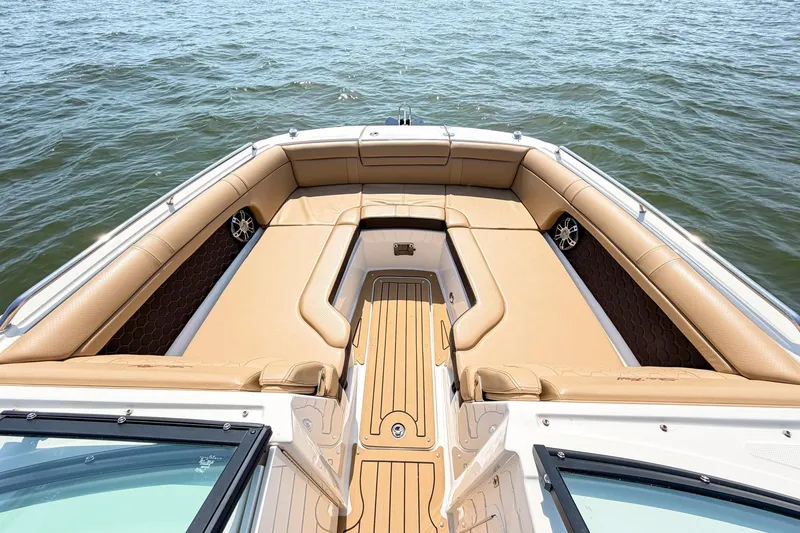 Slide: The Image of 2021 Sea Ray SDX 270 Outboard boat with tan seating on open water. - 10