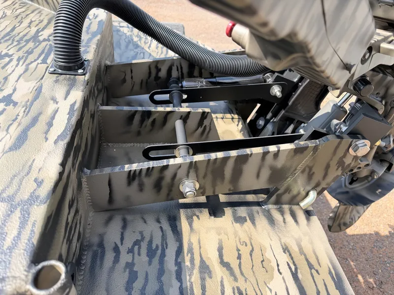 Slide: The Image of Close-up of a camouflaged aluminum boat with sturdy construction. - 4