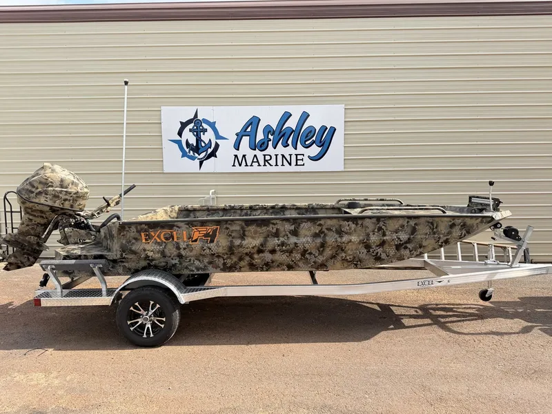 The Image of Excel Viper F4 1751 on an aluminum trailer in front of a building. - 1