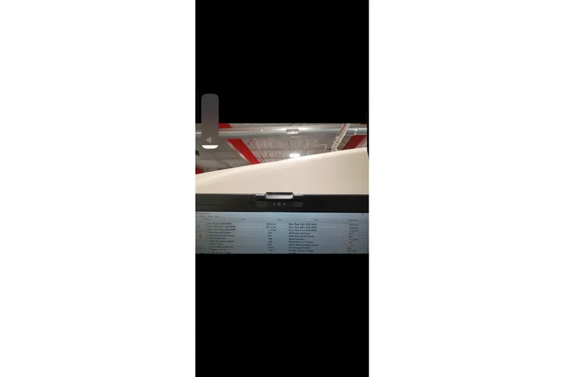 Slide: The Image of 2005 Monterey 268SS Super Sport boat in a garage with visible ceiling. - 12
