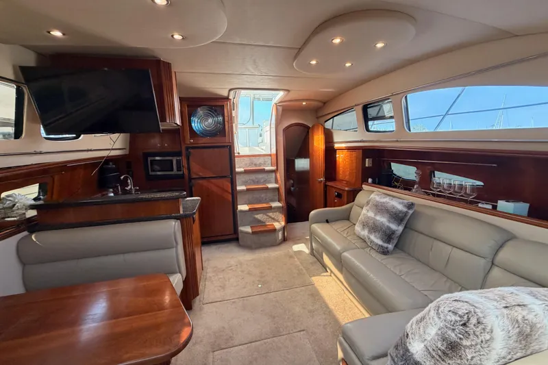 Slide: The Image of Luxurious interior of 2005 Cruisers Yachts 405 Express Motoryacht with plush seating and modern amenities. - 68