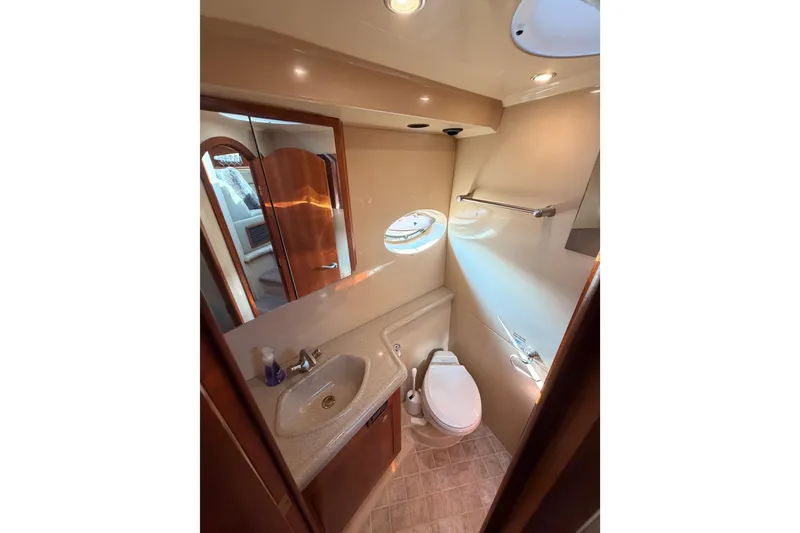 Slide: The Image of Luxurious bathroom in 2005 Cruisers Yachts 405 Express Motoryacht with modern fixtures. - 59