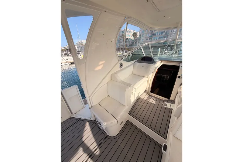 Slide: The Image of 2005 Cruisers Yachts 405 Express Motoryacht interior with seating and marina view. - 31
