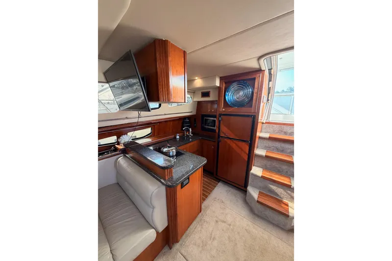 Slide: The Image of Luxurious interior of 2005 Cruisers Yachts 405 Express Motoryacht with modern amenities and elegant design. - 43