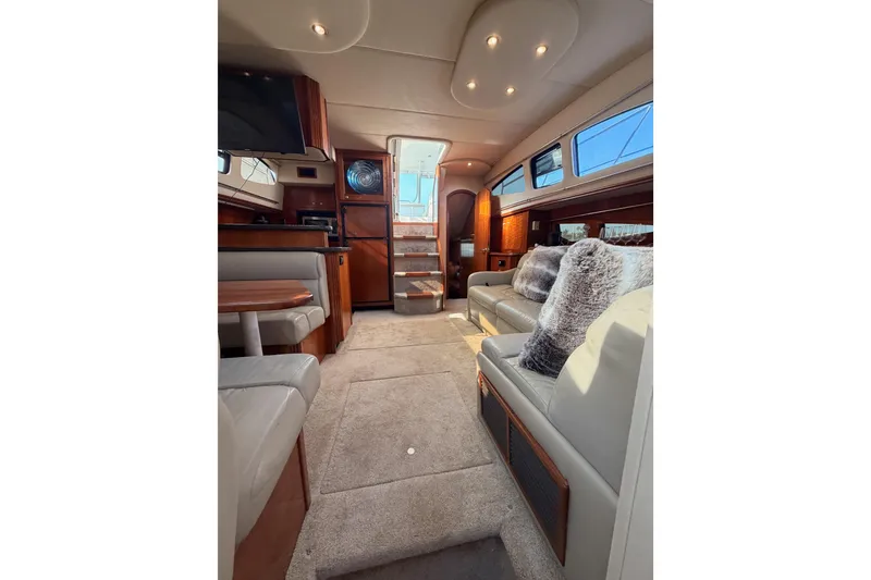 Slide: The Image of Luxurious interior of 2005 Cruisers Yachts 405 Express Motoryacht with plush seating and elegant design. - 67